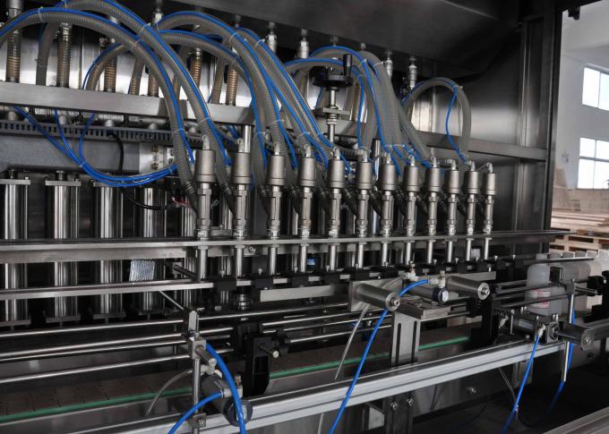 aŭtomata oleo pleniganta maŝinon